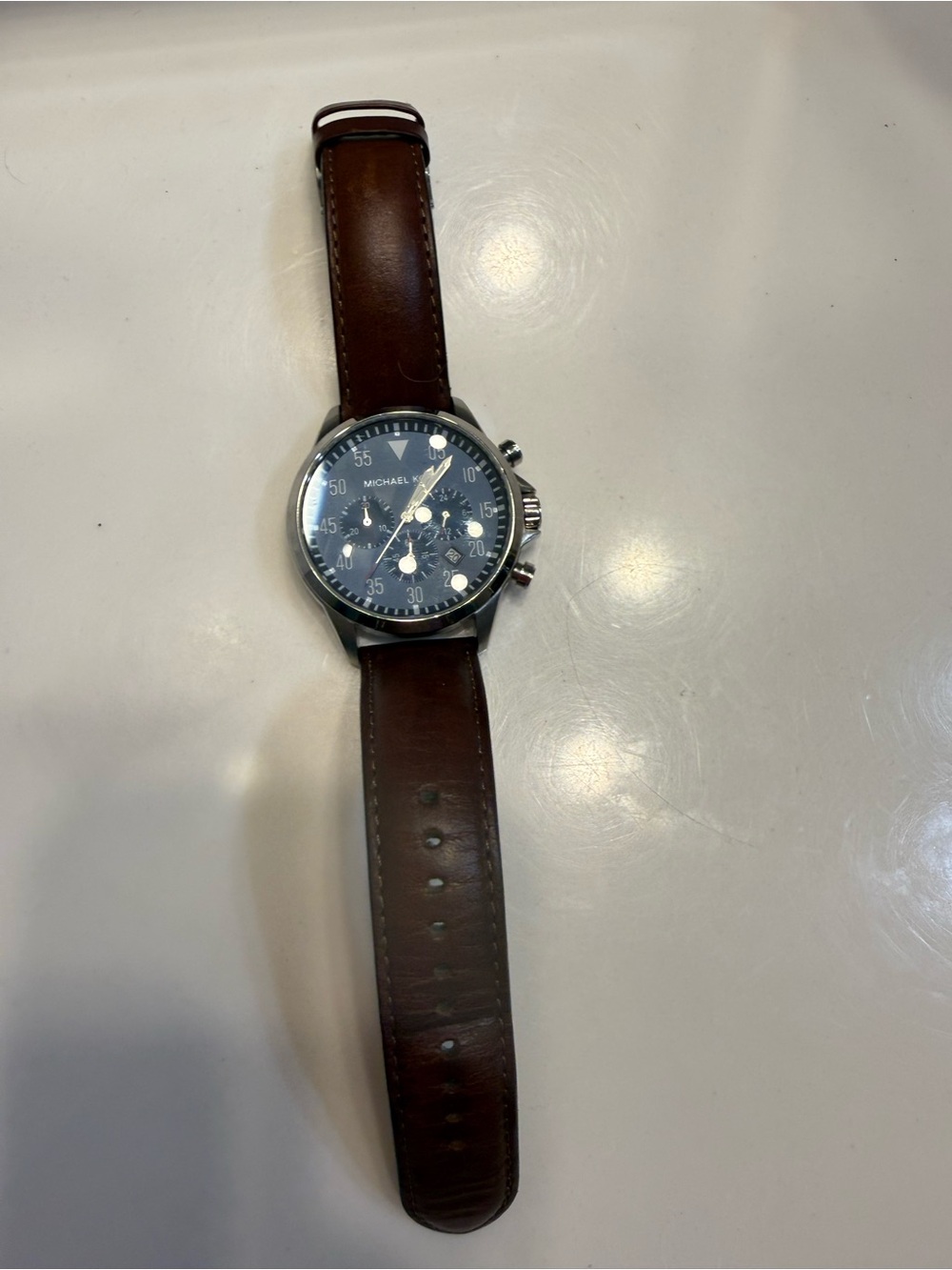 Michael Kohrs Men’s watch blue face brown leather strap
